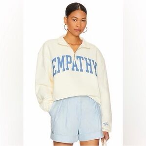 Cream Sweatshirt with Blue Empathy Print